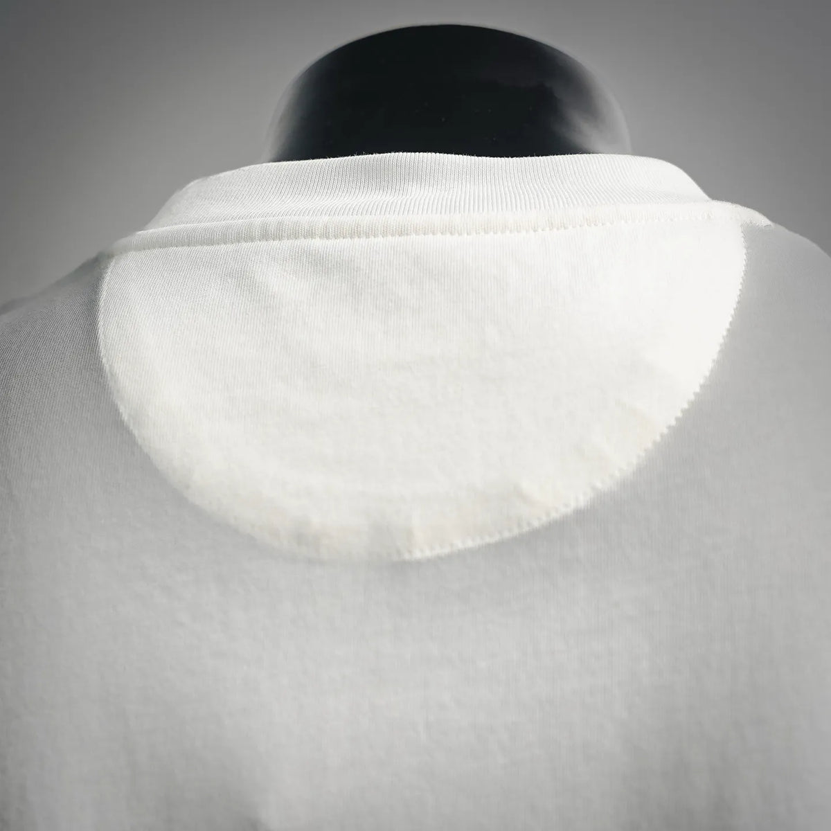 Fendi white short-sleeve T-shirt back neck close-up, smooth crew collar
