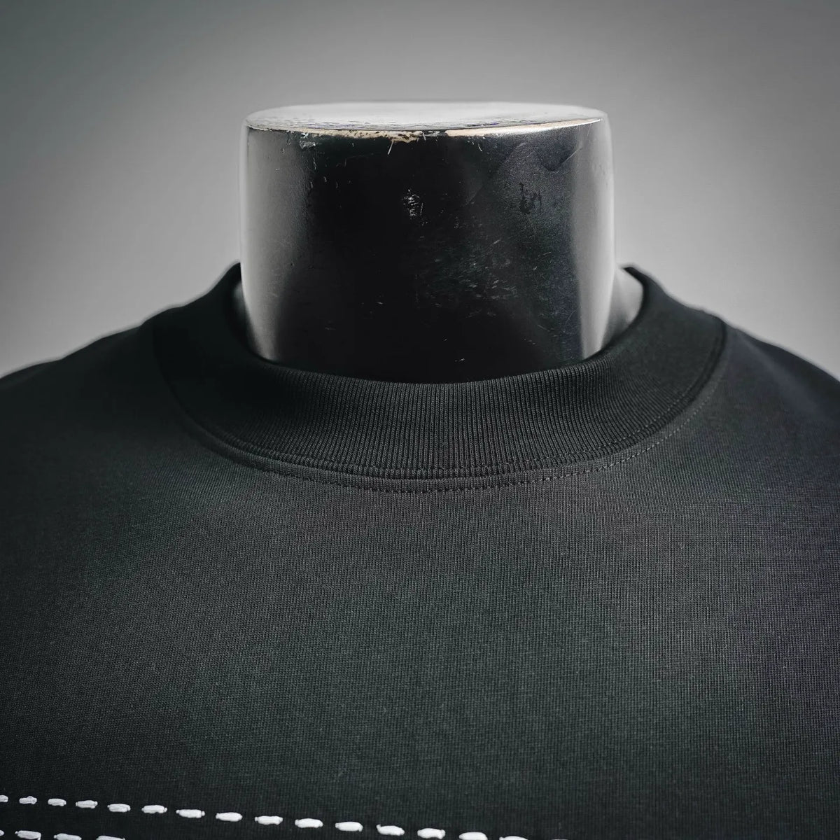 Black crew-neck T-shirt collar with ribbed neckline