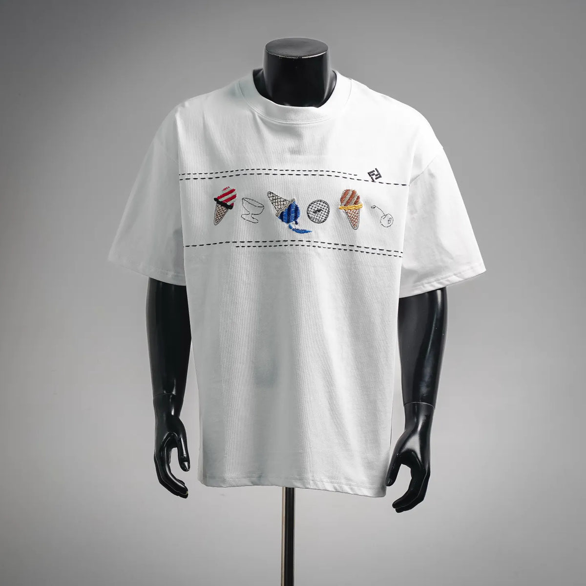 White crew-neck T-shirt with multicolor embroidered chest graphic
