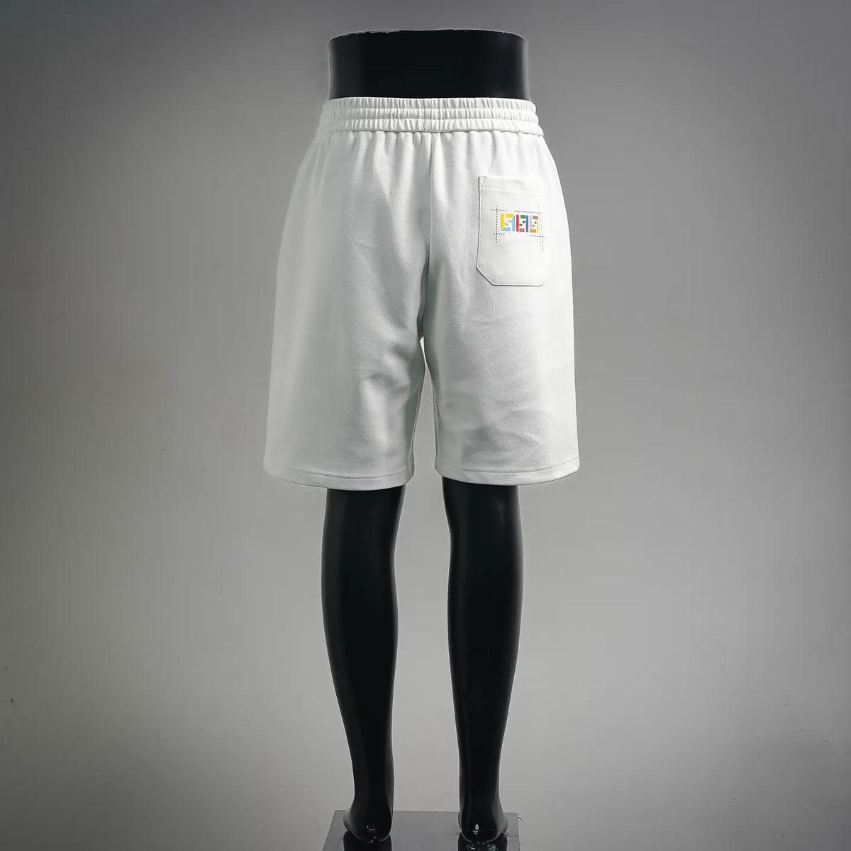 White Fendi drawstring shorts with side pocket and logo patch