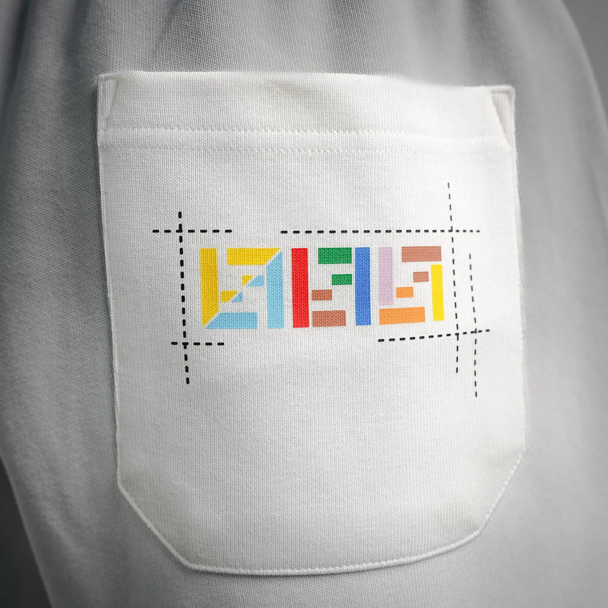 White Fendi shorts with front side pocket and multicolor logo print