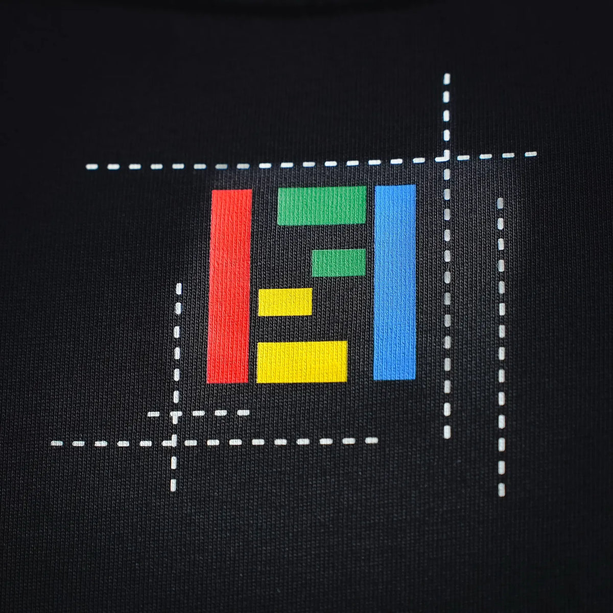 Black T-shirt with colorful square Fendi logo graphic print.