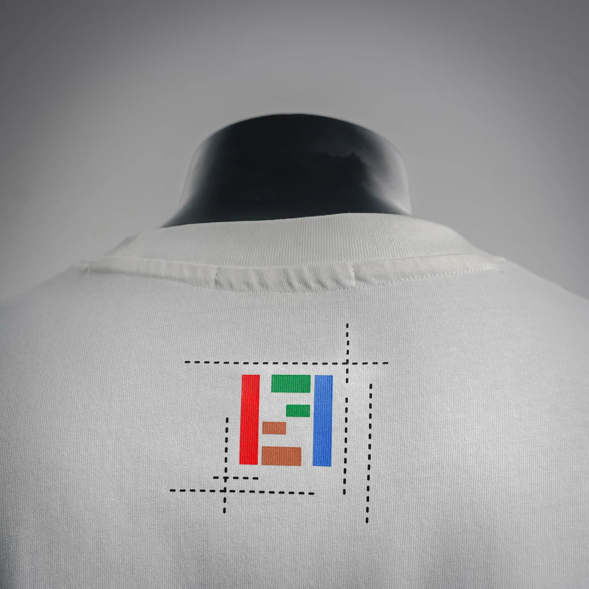 White Fendi T-shirt back with colorful logo graphic near the collar