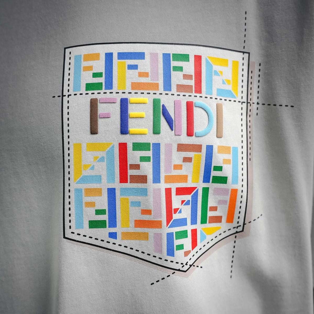 Large colorful Fendi logo graphic print on front of white T-shirt