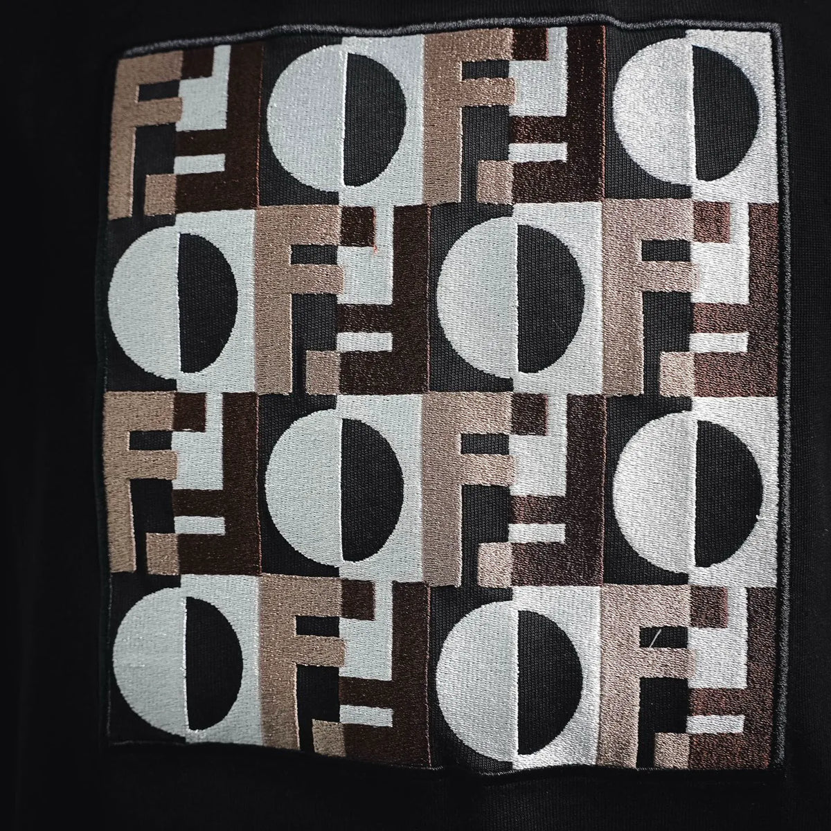 Fendi logo print square graphic on front of a black T-shirt