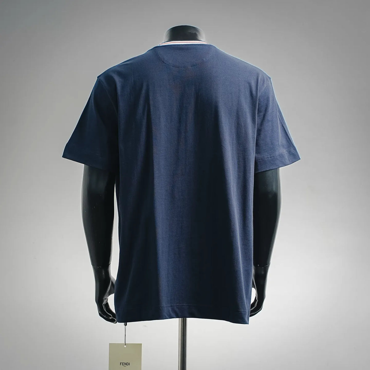 Fendi short-sleeve crewneck T-shirt in dark blue, back view, with striped collar trim