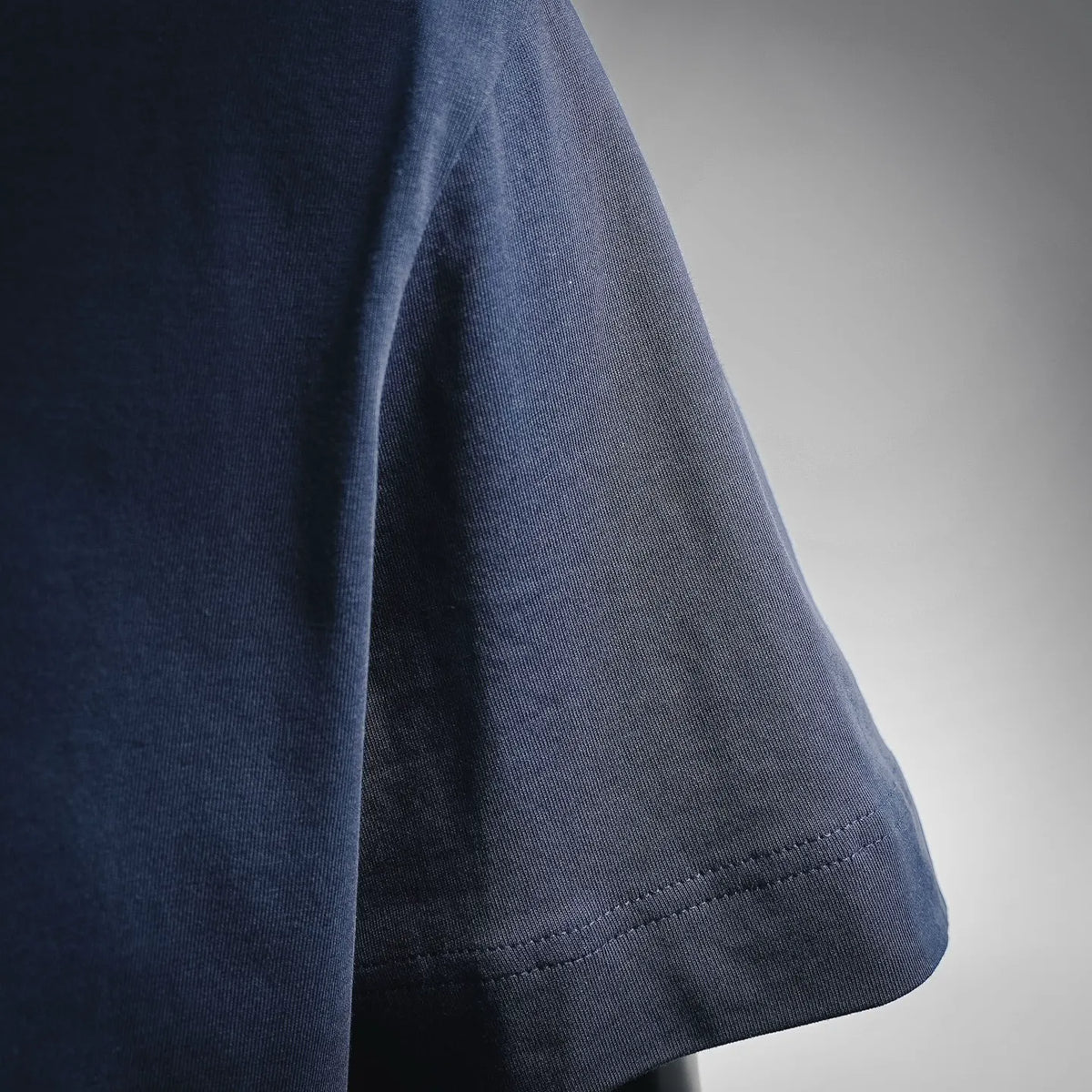 Fendi T-shirt sleeve and hem in dark blue with neat stitched edge