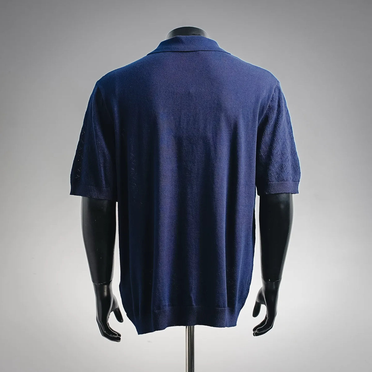 Fendi short-sleeve polo shirt, back view in deep blue knit with ribbed collar