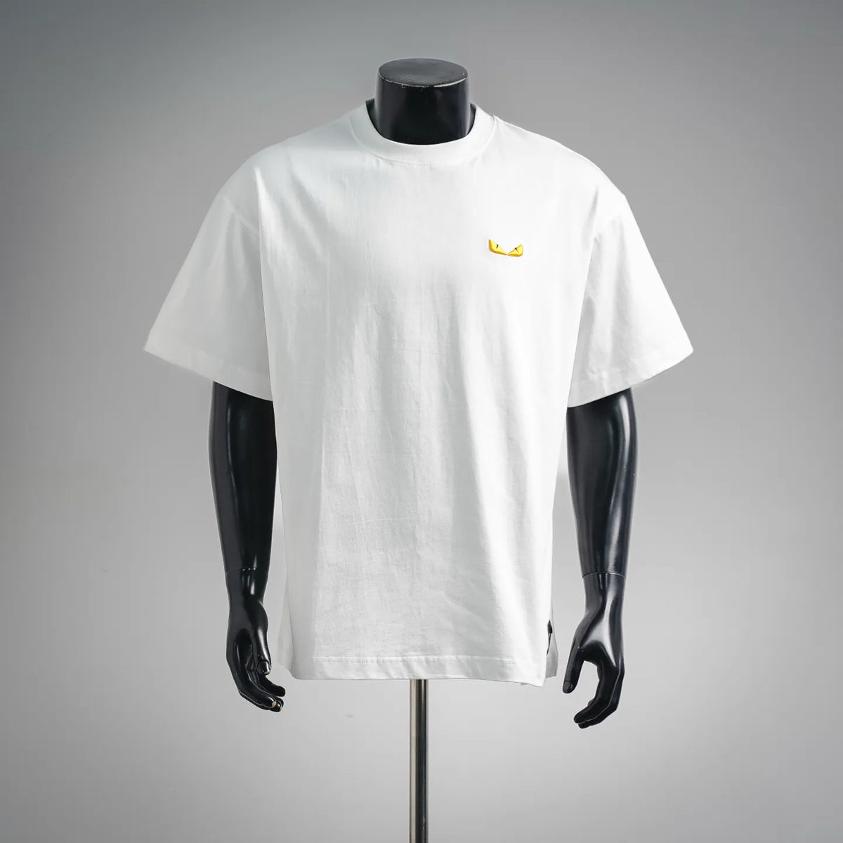 Fendi short-sleeve T-shirt, white crew neck with small yellow logo on chest