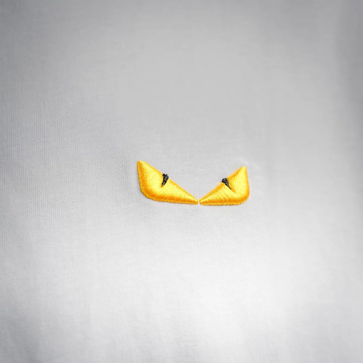 Fendi short-sleeve T-shirt, small yellow logo applique on white fabric