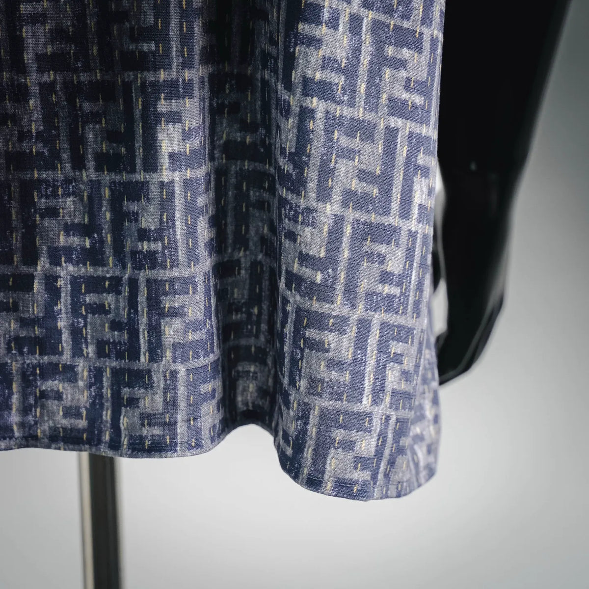 Blue and white Fendi monogram short-sleeve shirt, close-up of hem