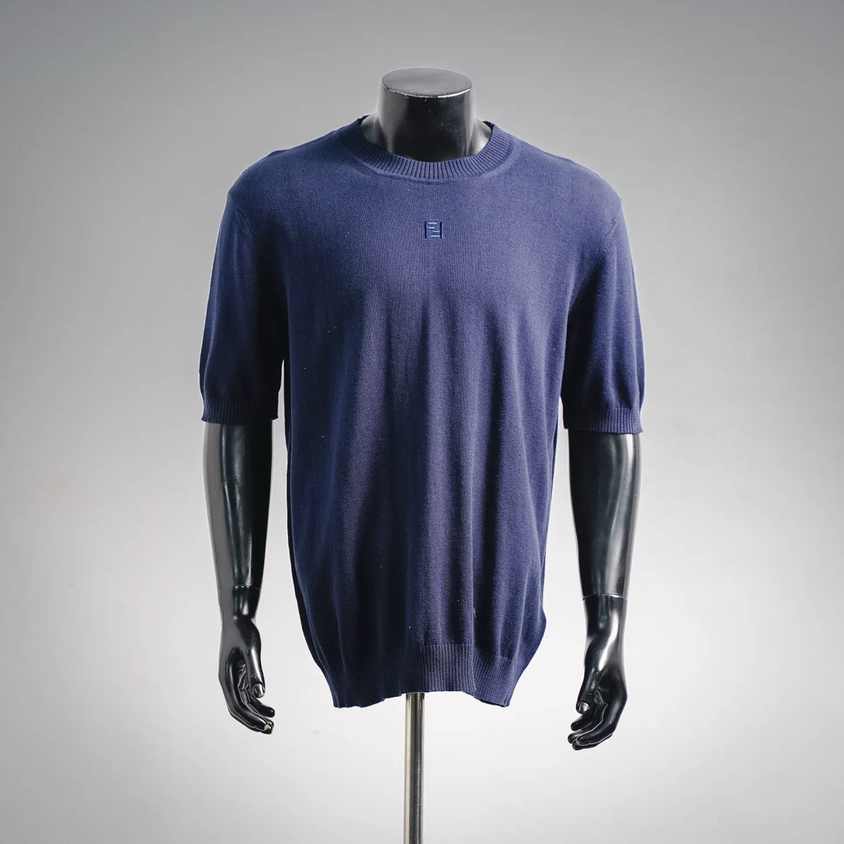Blue knit crewneck sweater with ribbed cuffs and hem, Fendi logo on chest