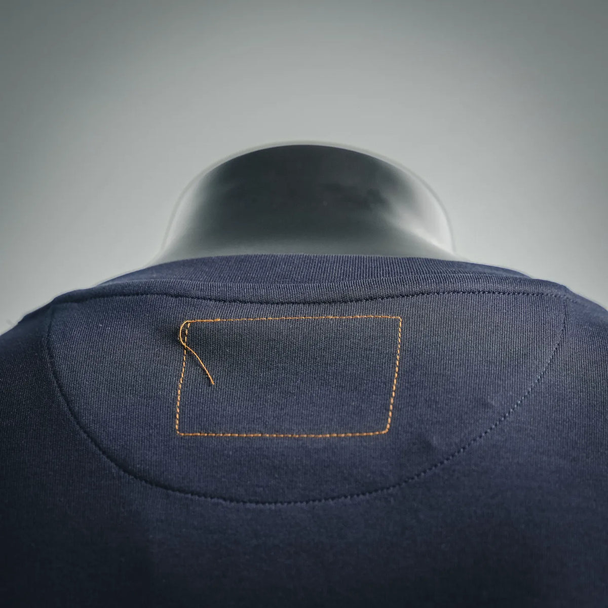 Fendi dark blue short-sleeve shirt back with rectangular orange-stitched patch