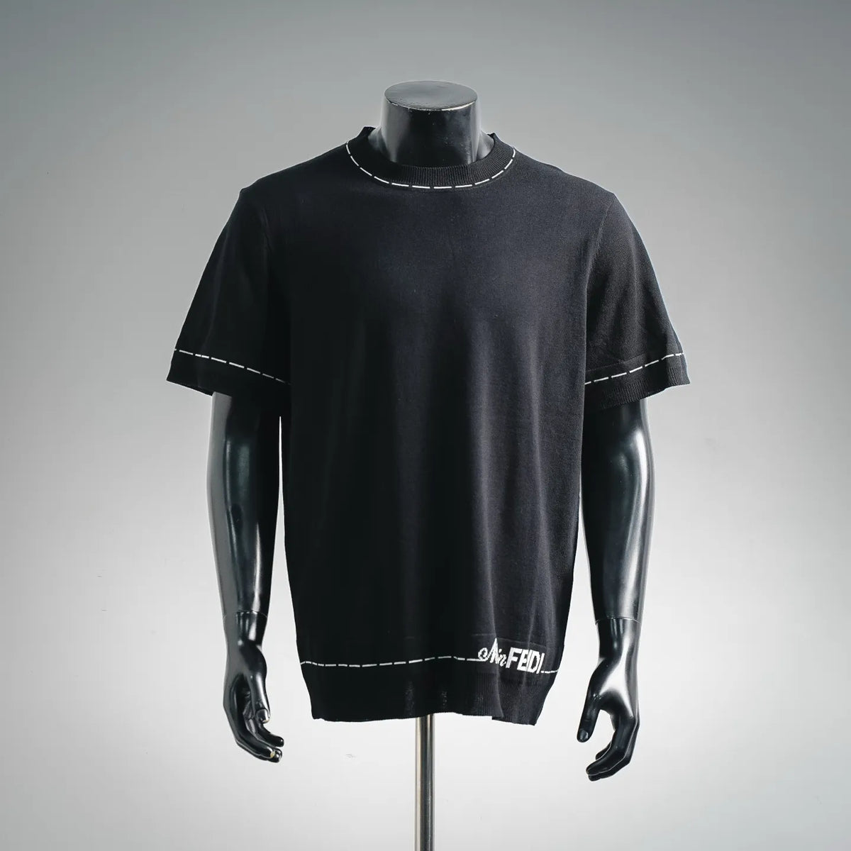 Fendi black knit T-shirt with crew neck and white stitched trim at hem and sleeves