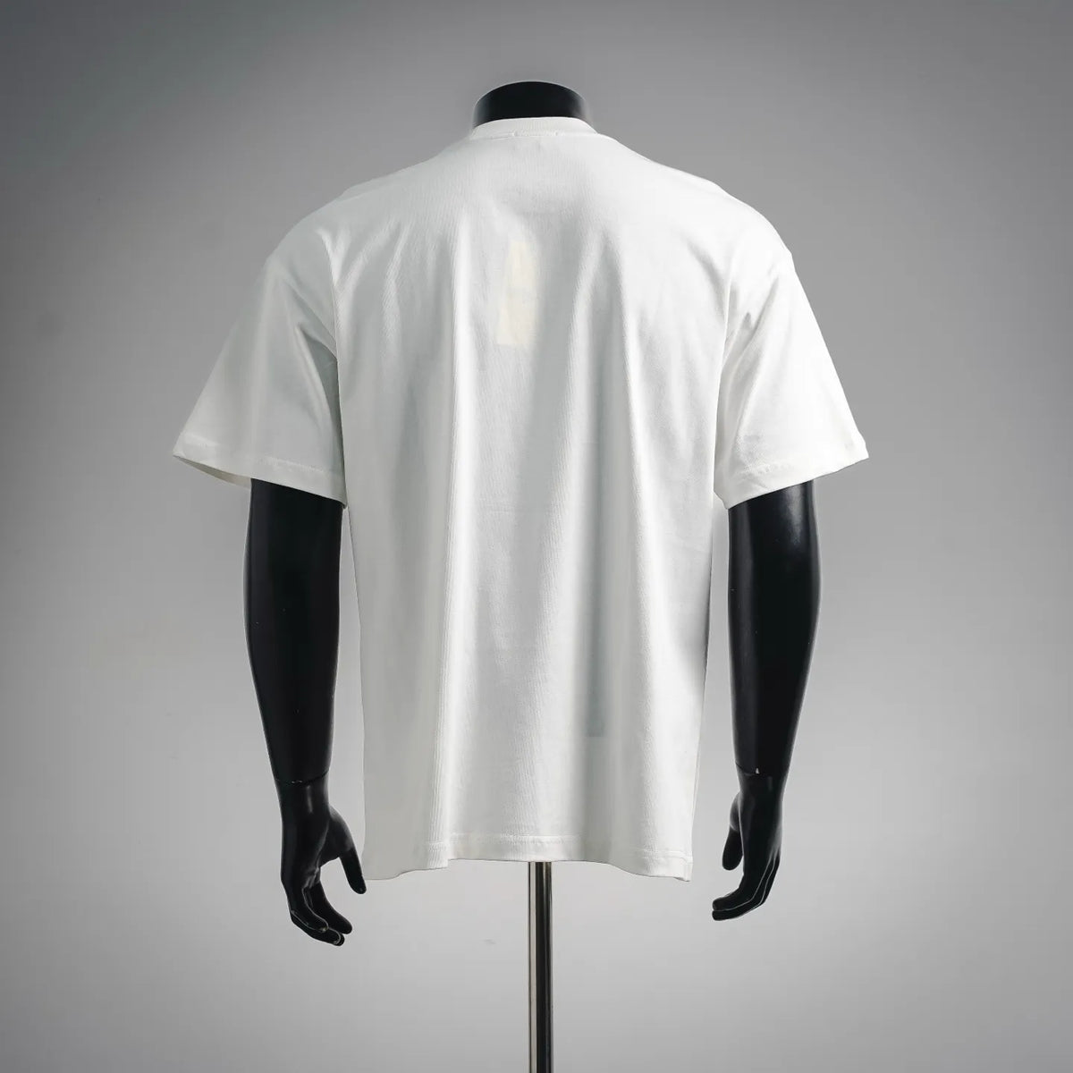 White short-sleeve T-shirt on mannequin, plain back with crew neckline