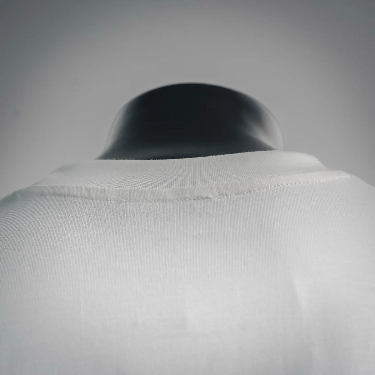 White T-shirt back neckline with stitched collar edge