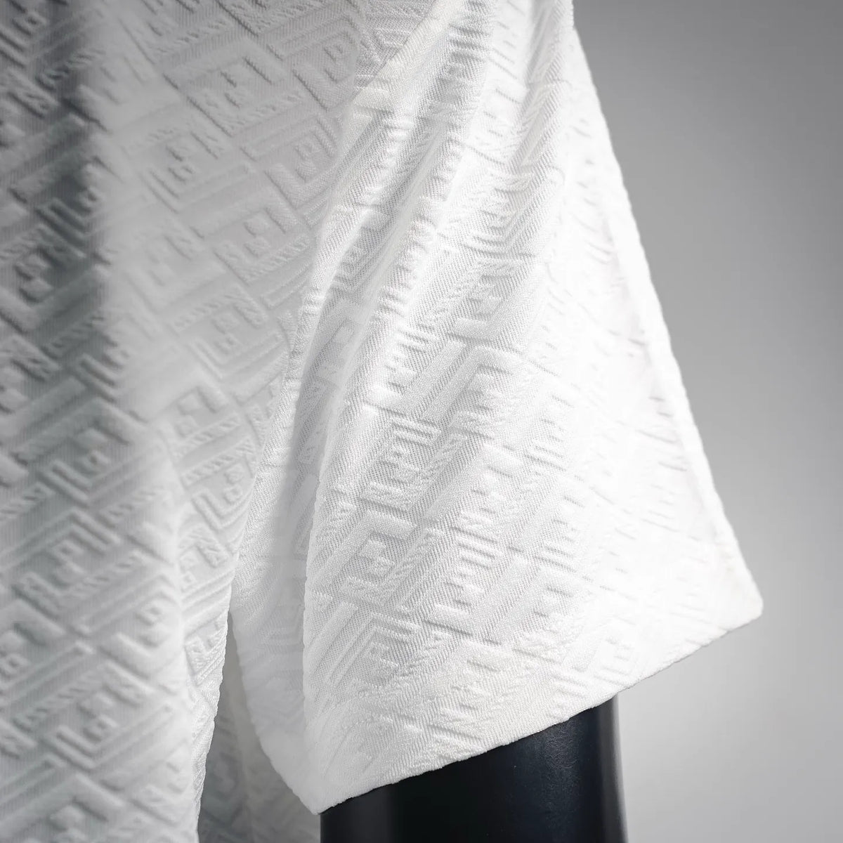 FENDI white short-sleeve T-shirt detail, textured monogram pattern on sleeve