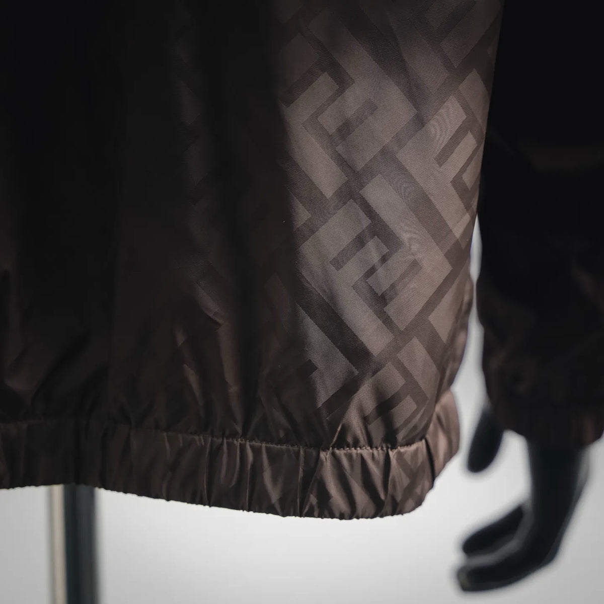 Coat hem with elastic waistband and FF logo pattern fabric