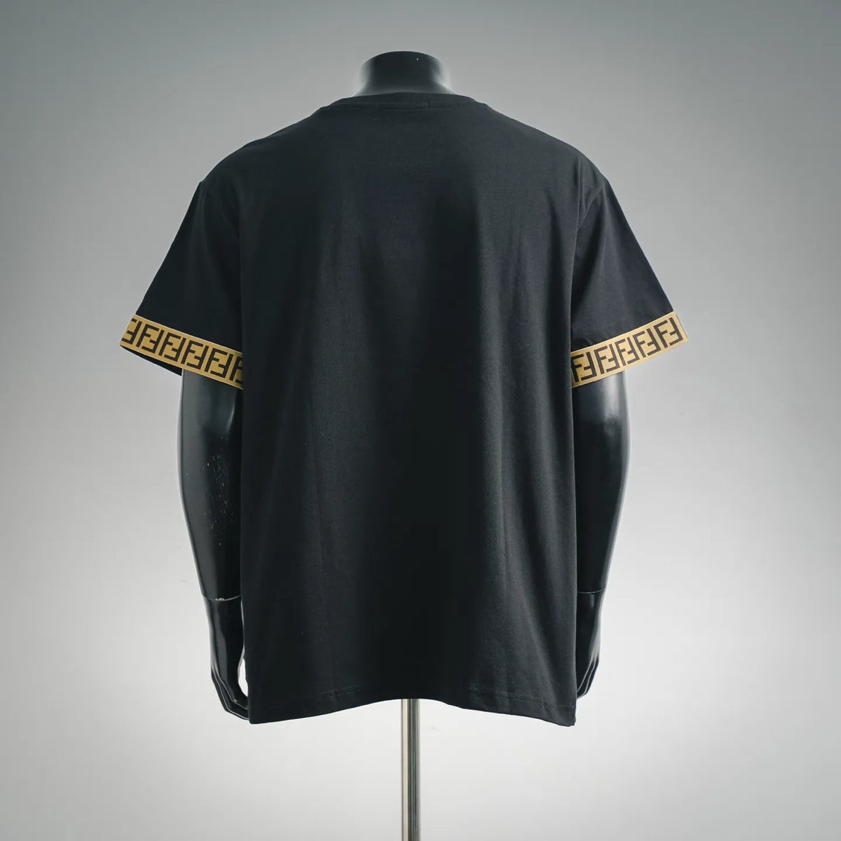 Black Fendi T-shirt back view with gold logo band on both sleeves
