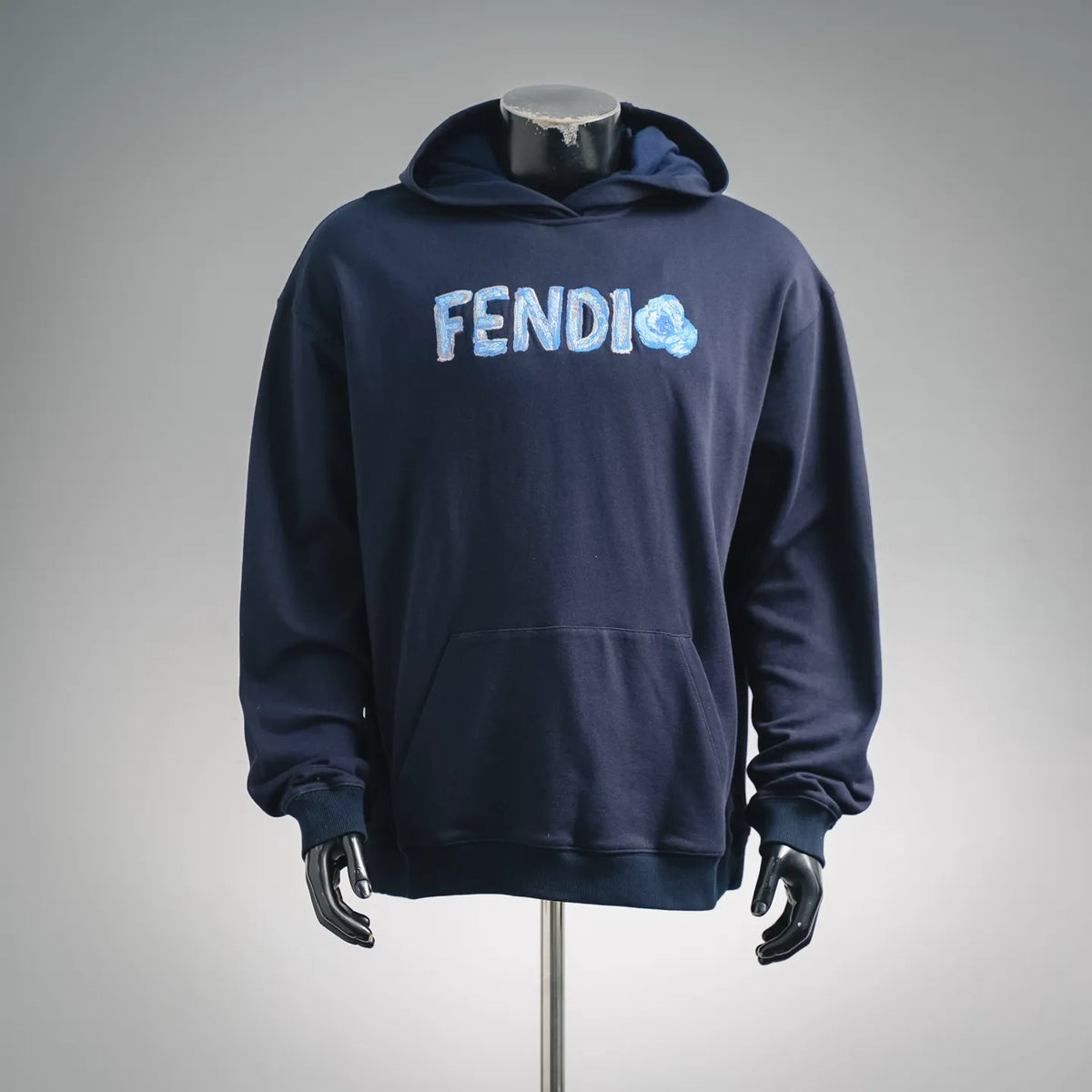 Navy FENDI hooded sweatshirt with blue embroidered FENDI lettering on the front