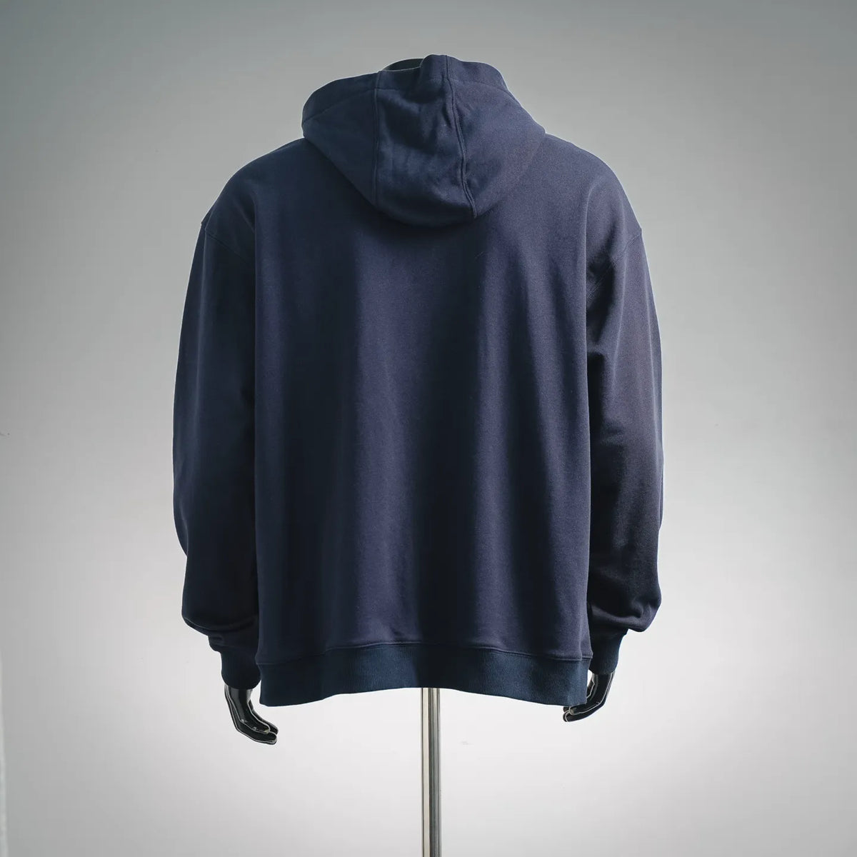 Navy FENDI zipless hoodie with drawstring hood and ribbed cuffs, back view