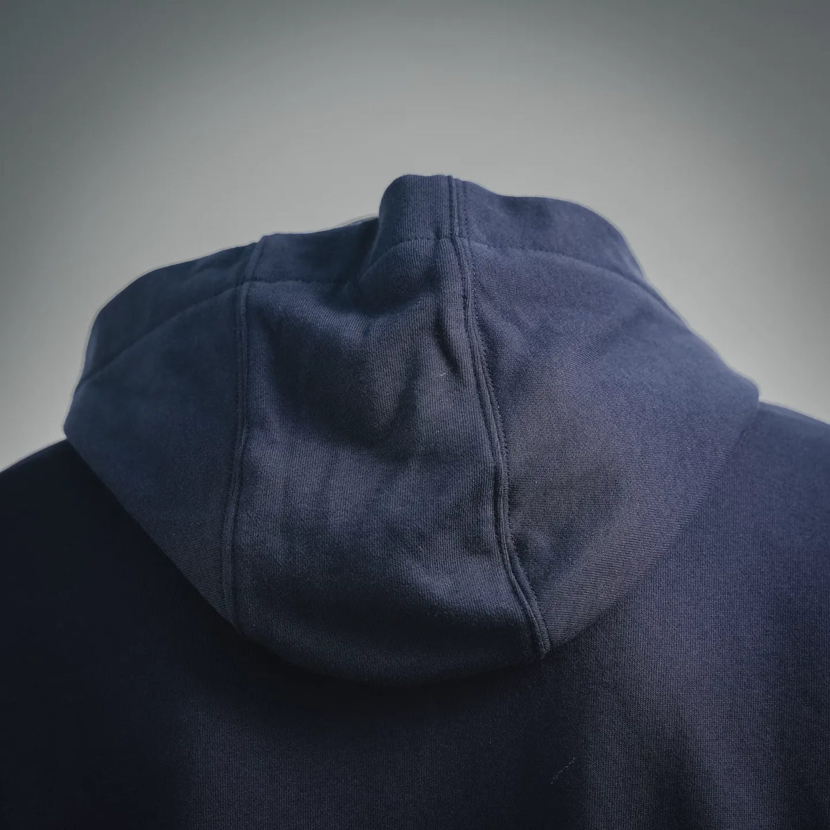 Navy FENDI hoodie hood seam detail with front pocket and stitched panel