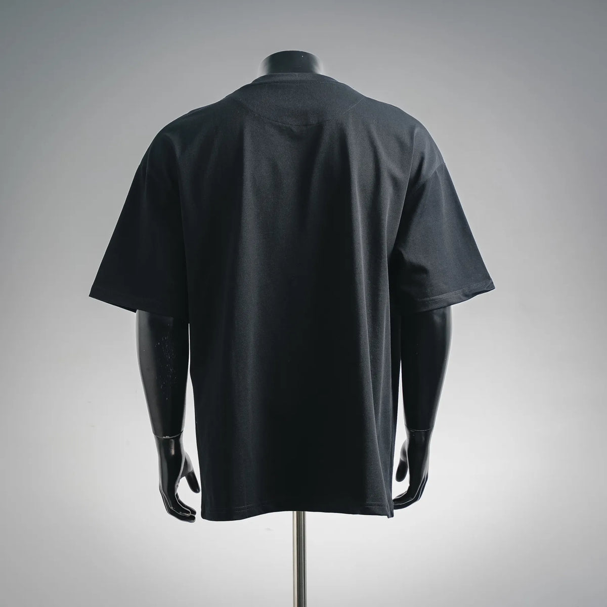 Men's short-sleeve T-shirt, dark blue/black, back view with clean crew neckline