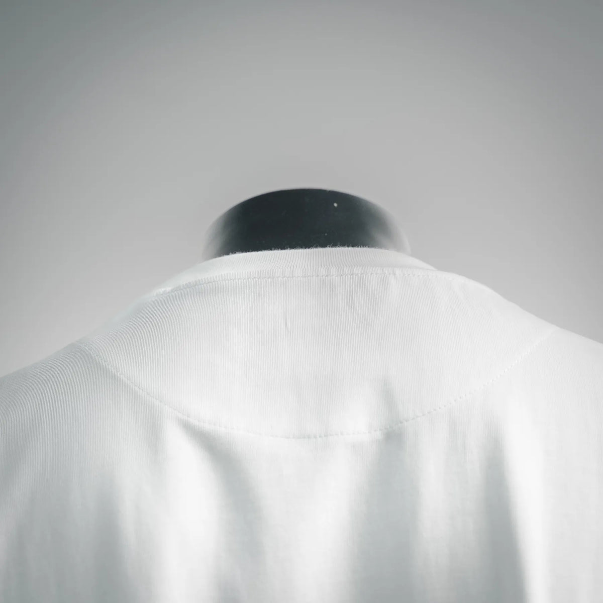 White T-shirt back collar seam detail