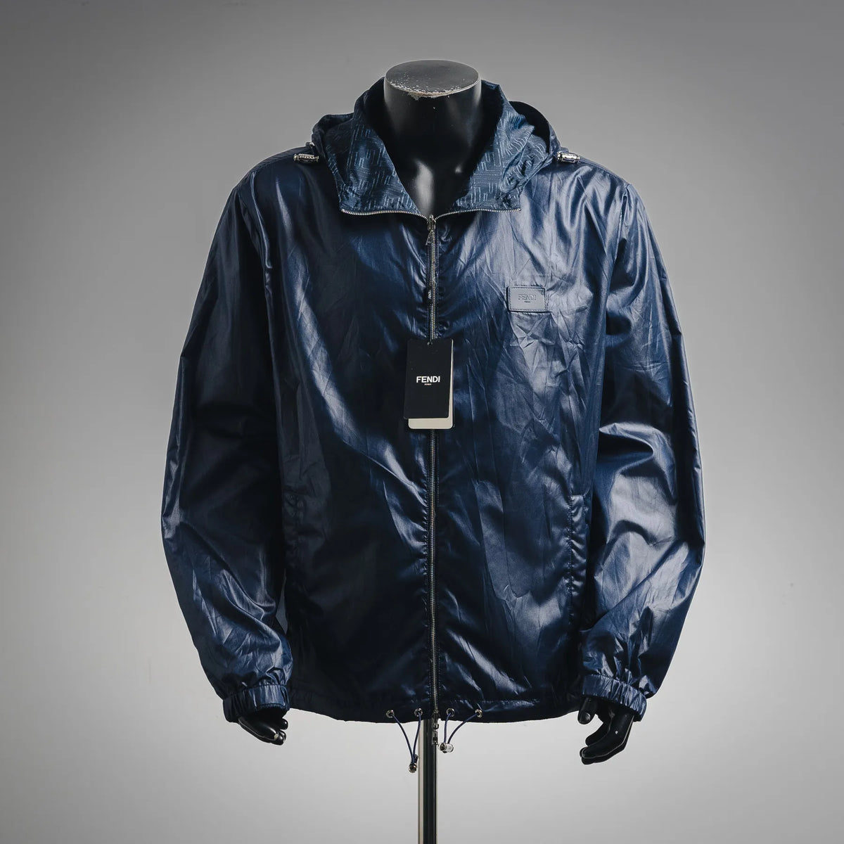 Fendi dark blue hooded coat with full-zip, collar, and logo tag