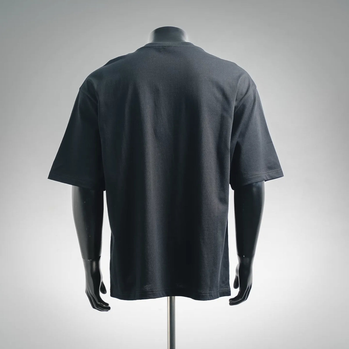 Dark short-sleeve T-shirt showing back view