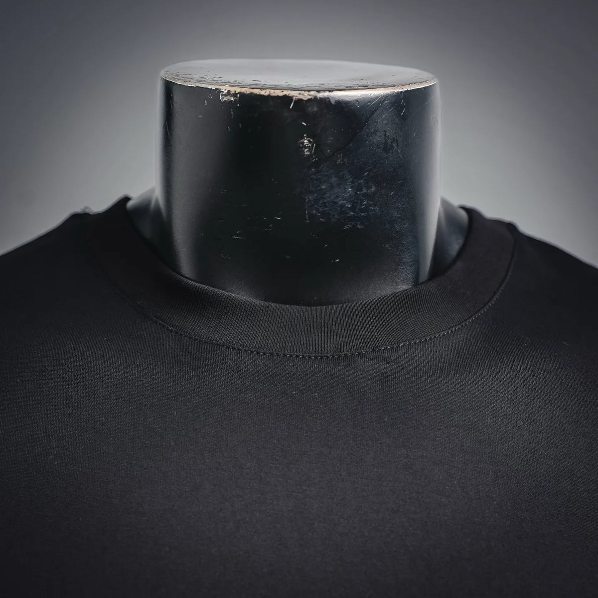 Black crewneck T-shirt neckline with ribbed collar