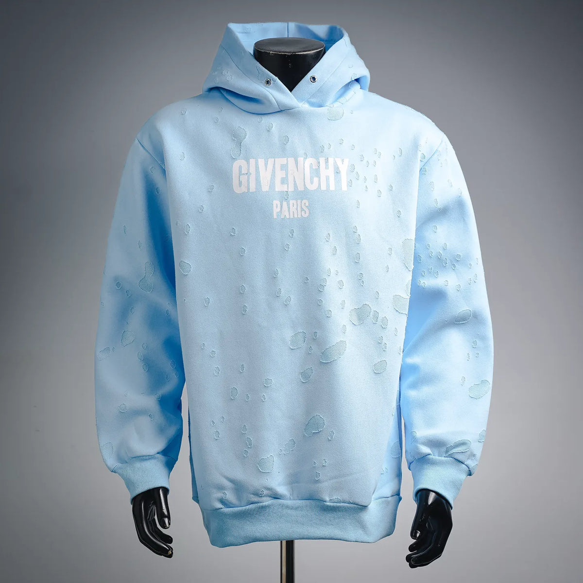 Light blue Givenchy Paris hooded sweatshirt with front logo print and pouch pocket