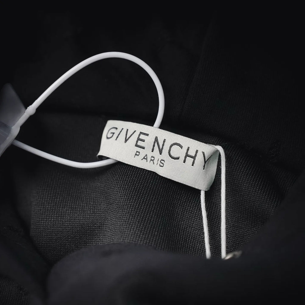 Neck label on black sweatshirt with white GiveNCHY Paris branding