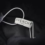 Neck label on black sweatshirt with white GiveNCHY Paris branding