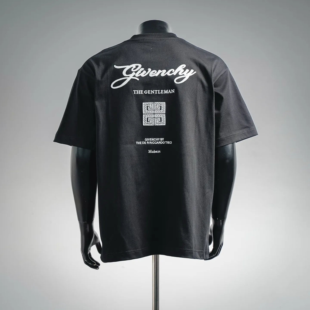 Black crewneck T-shirt with large back Givenchy logo and text graphic