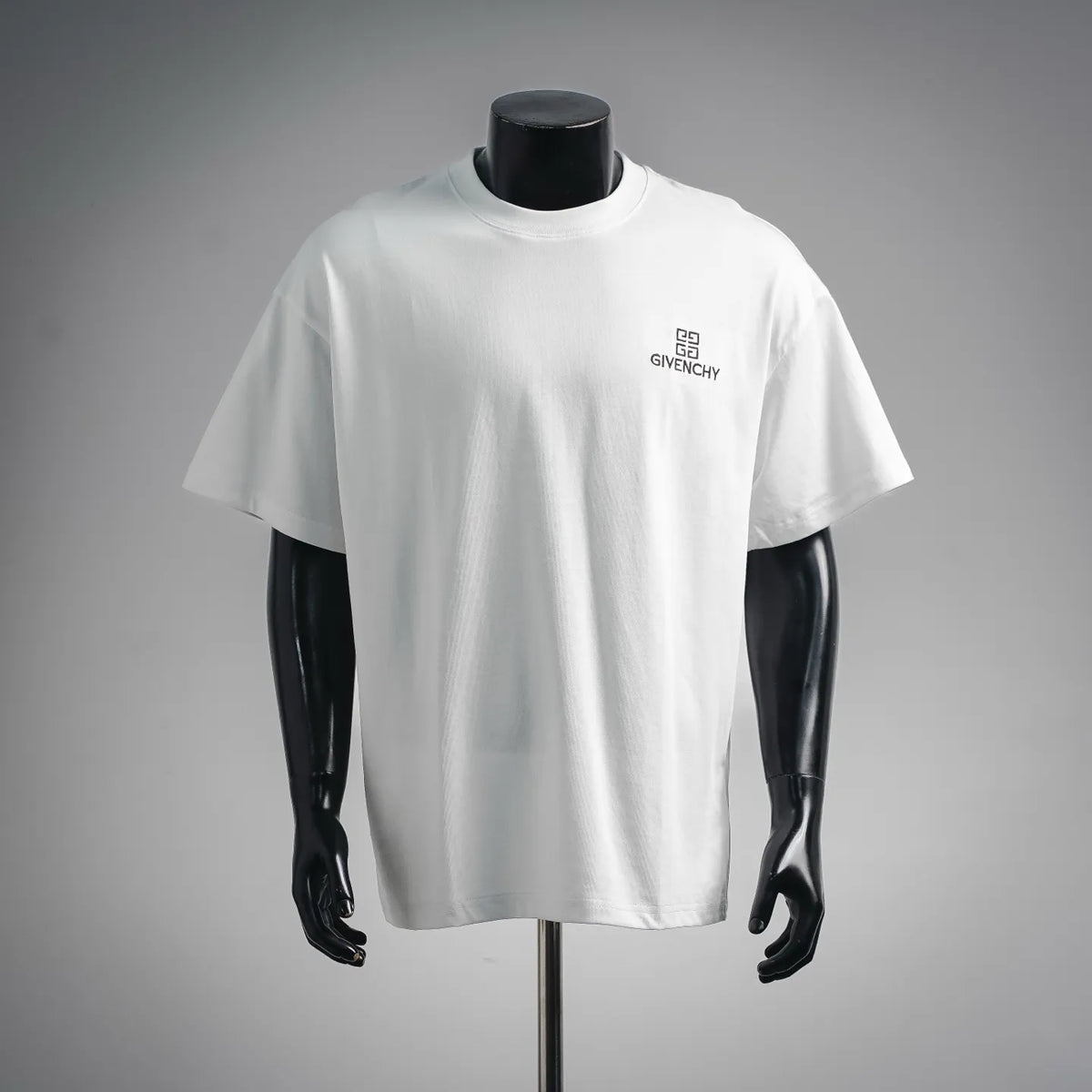 White short-sleeve T-shirt with small Givenchy logo on left chest