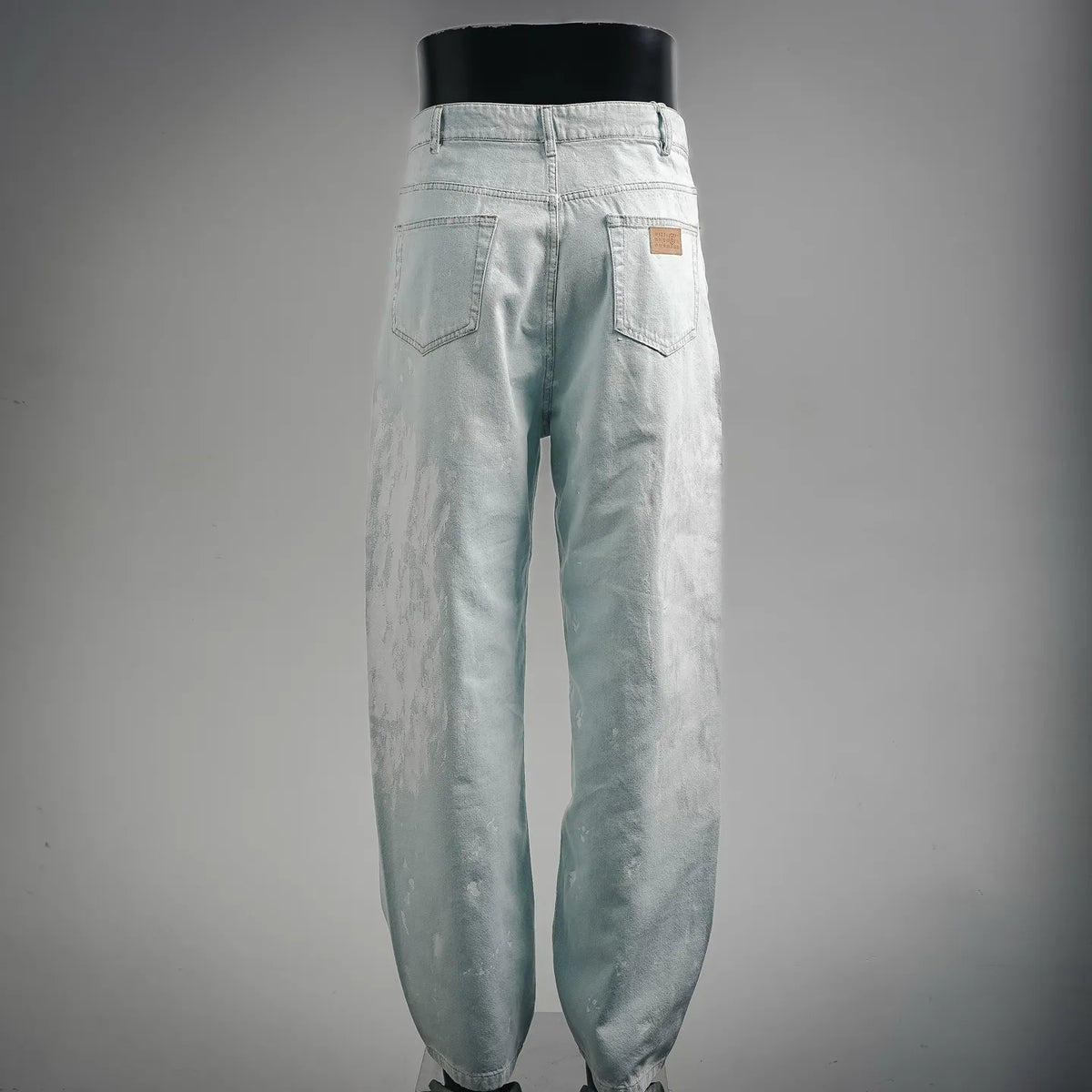 Maison Margiela light blue denim pants with two back pockets and relaxed fit