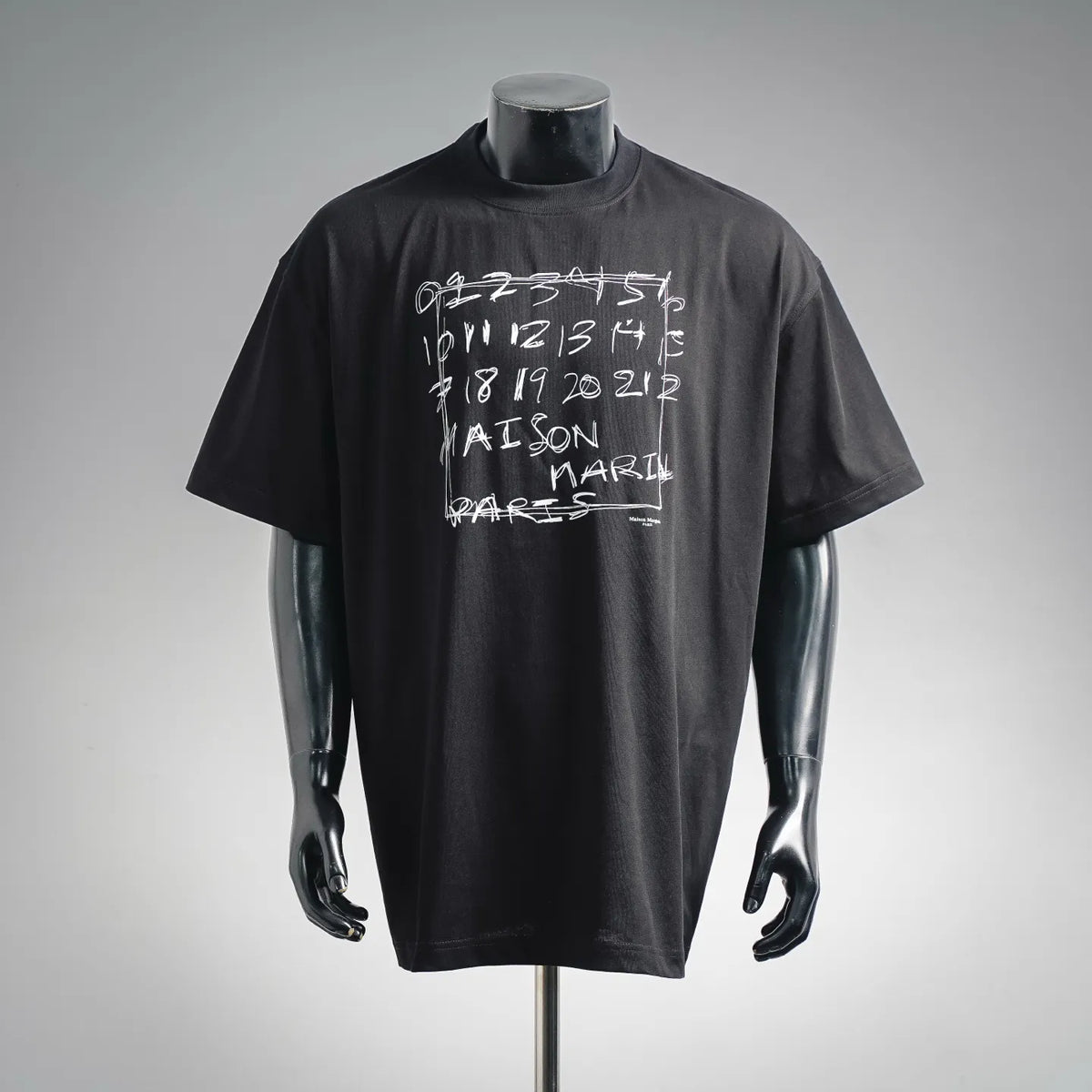 Black Maison Margiela T-shirt with white abstract graphic print at chest