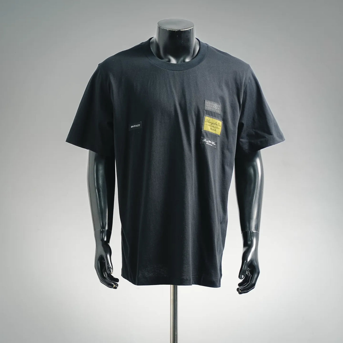Dark short-sleeve crewneck T-shirt with small chest logo patch