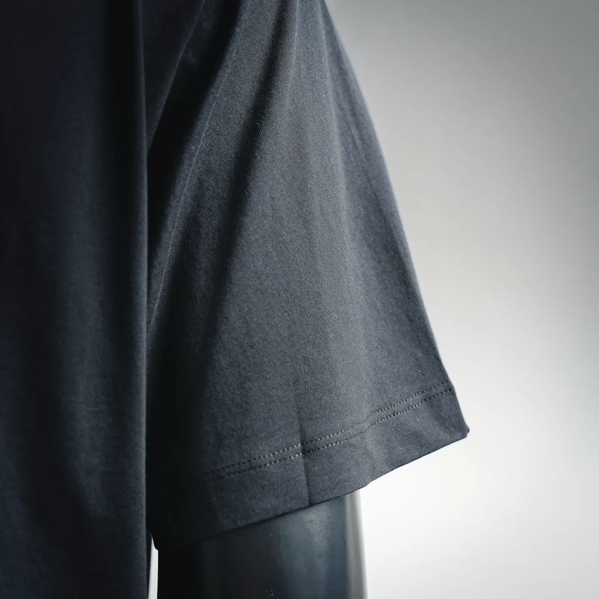 Dark T-shirt short sleeve with stitched hem detail