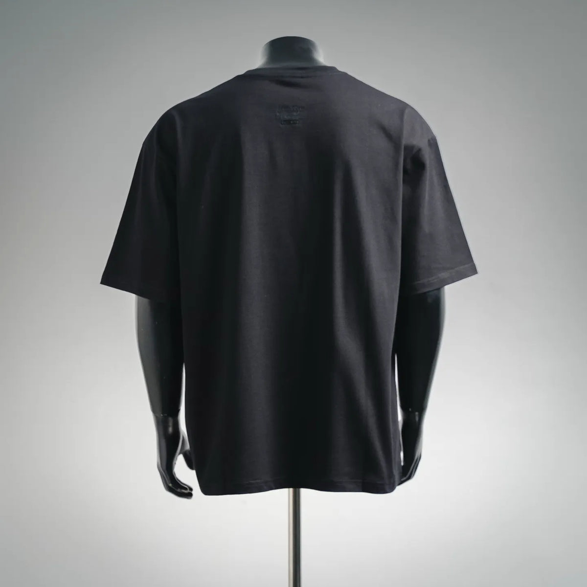 Black short-sleeve T-shirt back view, plain with crew neck