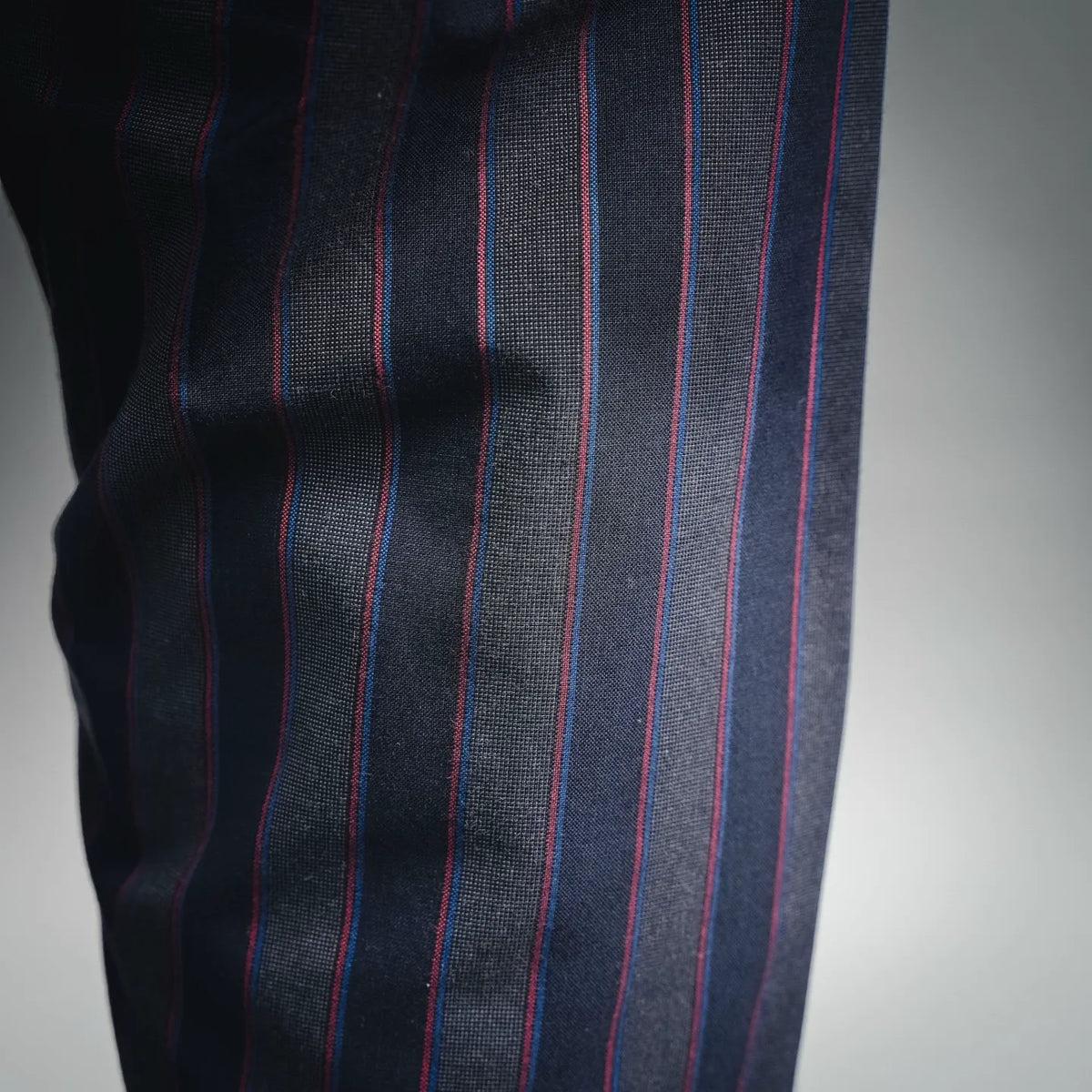 Maison Margiela pinstriped fabric panel in dark navy with red and blue vertical lines