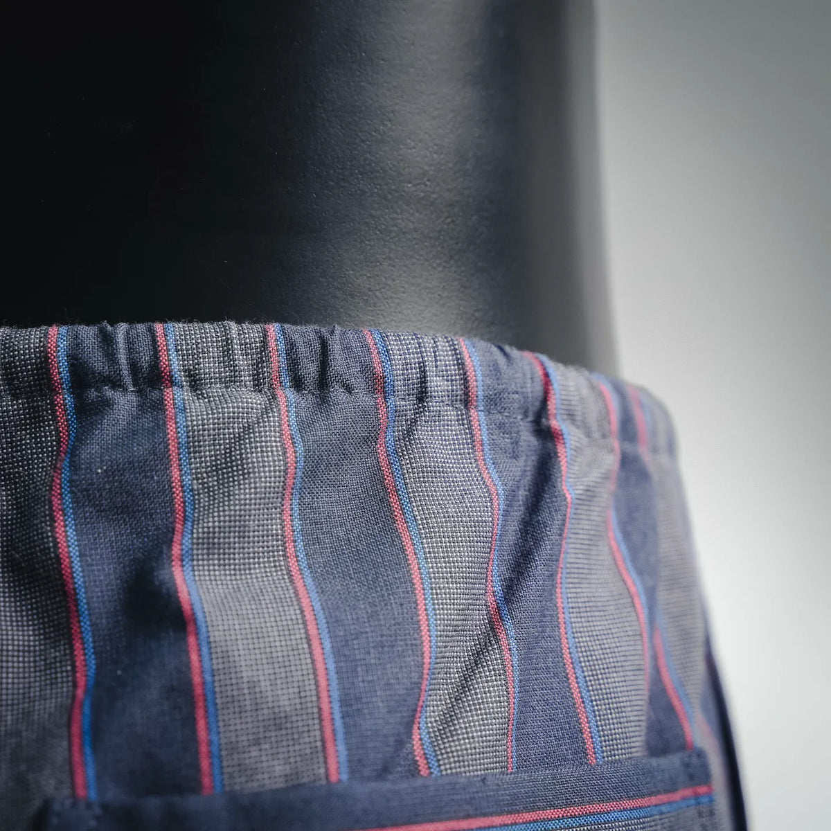 Maison Margiela striped pants elastic waistband and hem detail in dark navy pinstripes