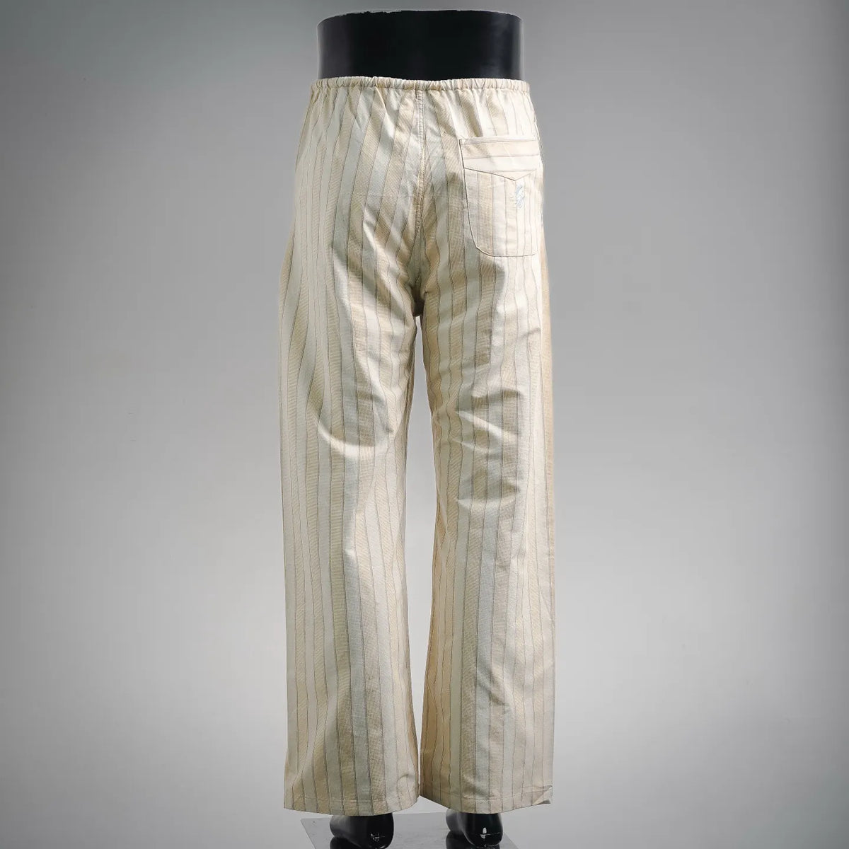 Cream striped wide-leg pants with elastic waistband, full front view