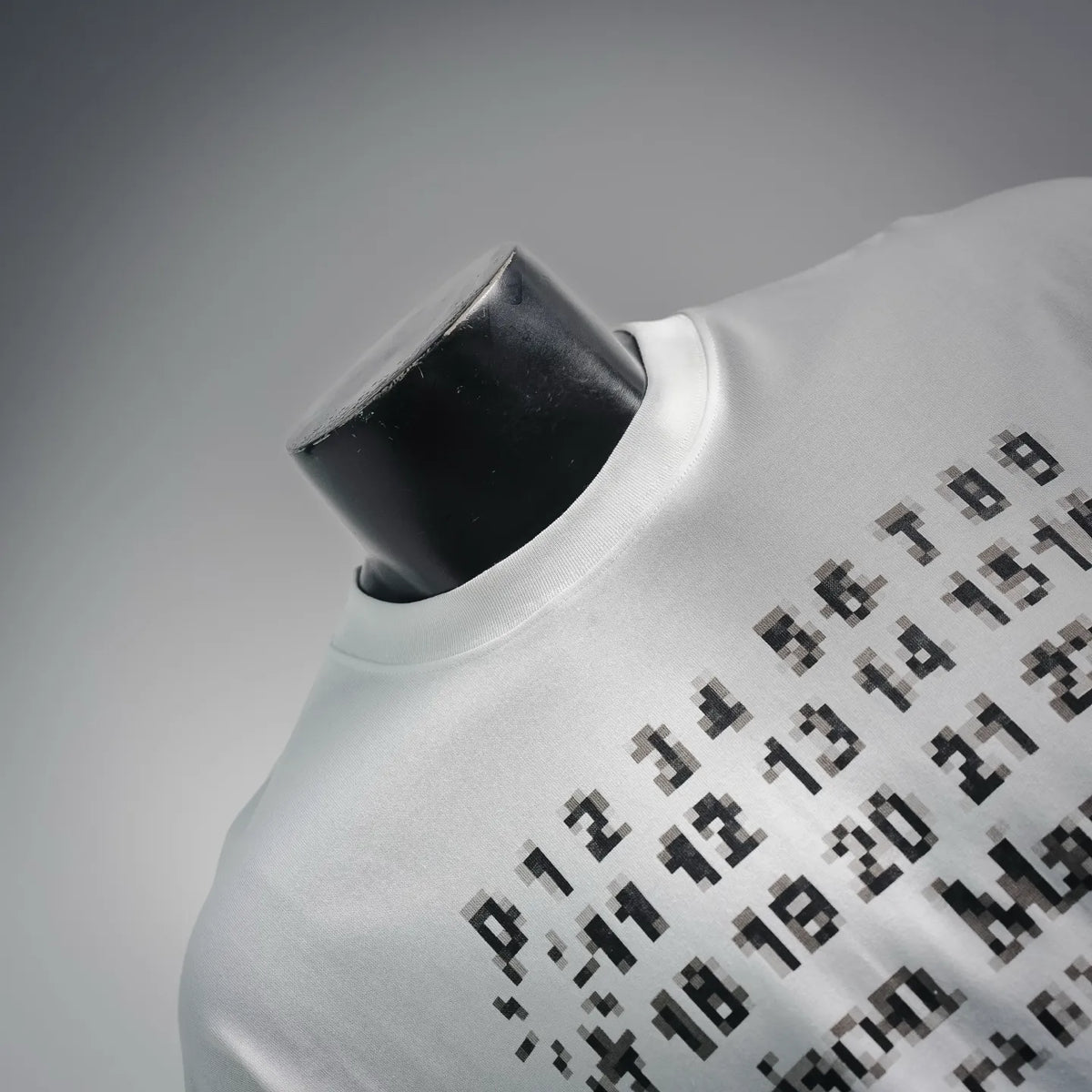 White short-sleeve T-shirt neckline and pixel logo graphic detail