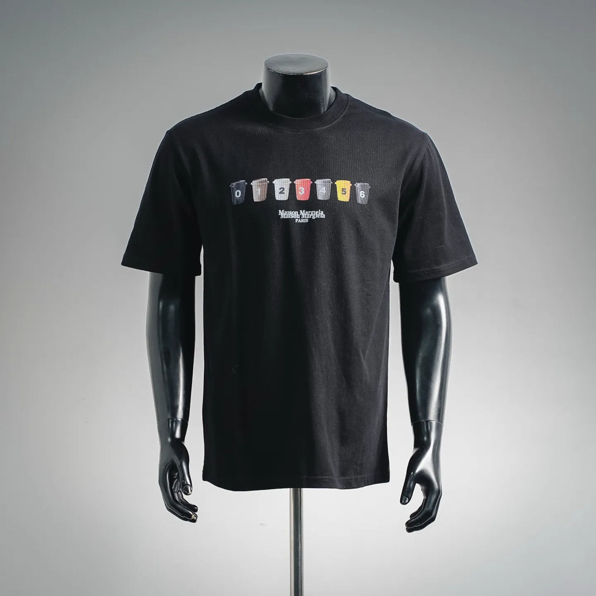 Black short-sleeve T-shirt with crew neck and colorful numbered graphic on chest