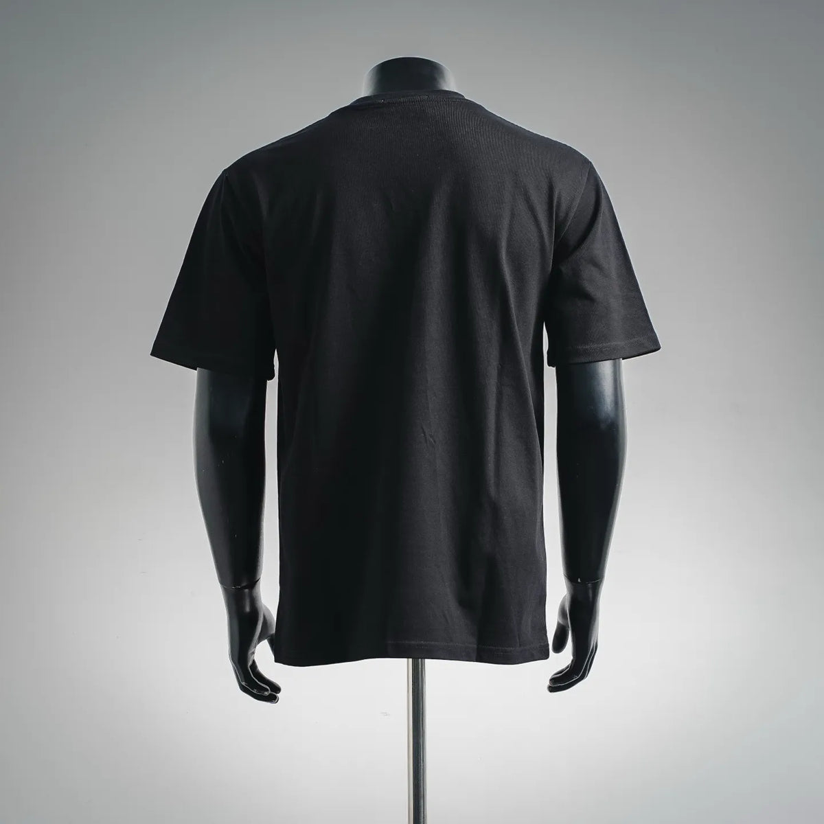 Black short-sleeve T-shirt back view with plain design and crew neck