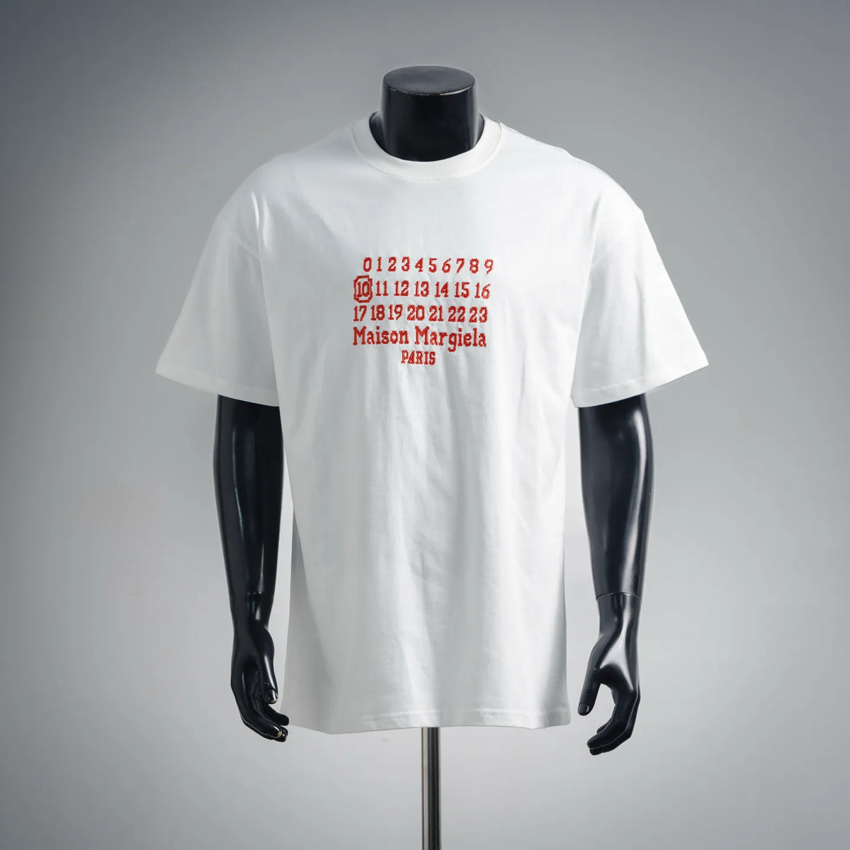 White crew-neck T-shirt with red numerals and Maison Margiela PARIS graphic