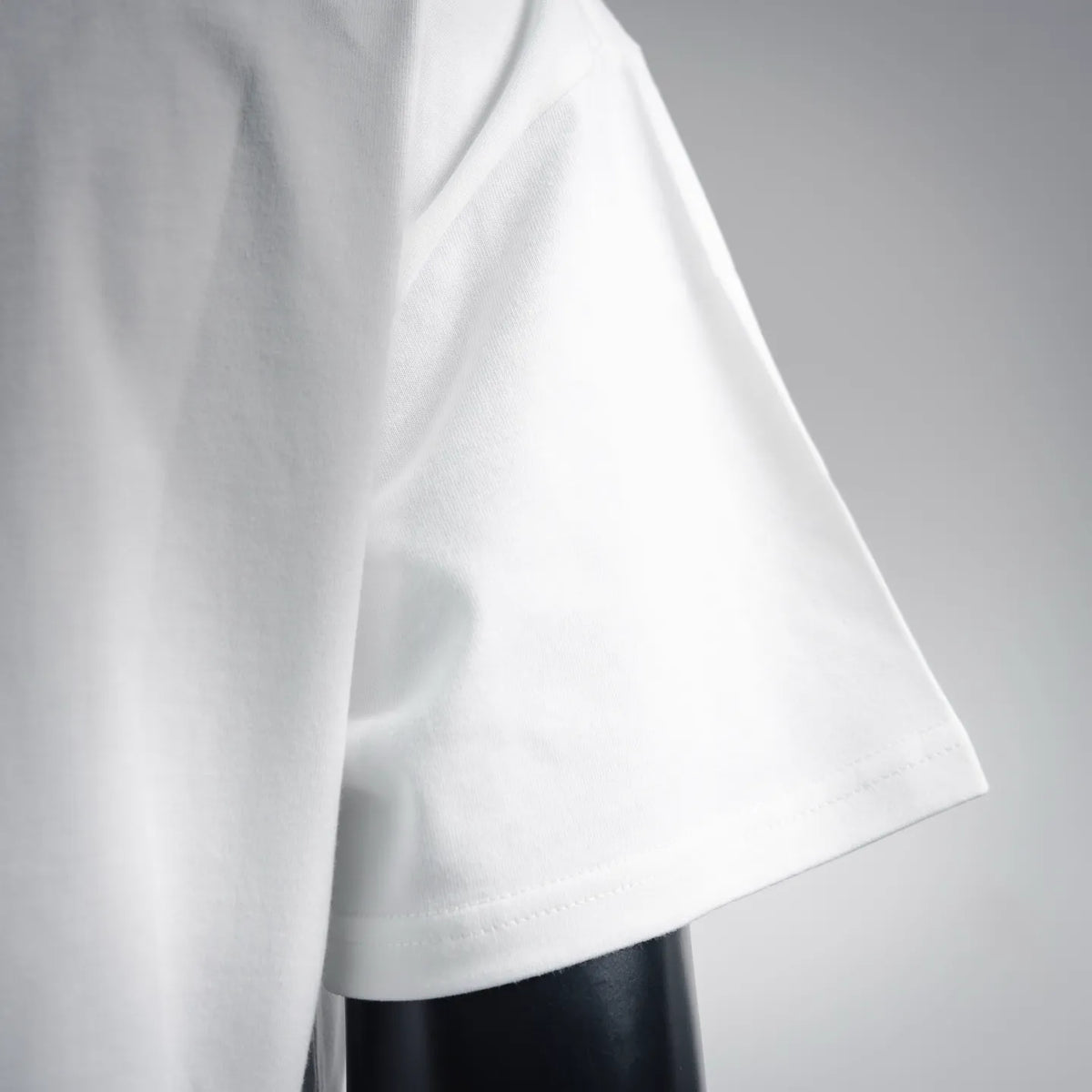 White T-shirt with short sleeve and smooth fabric fold detail