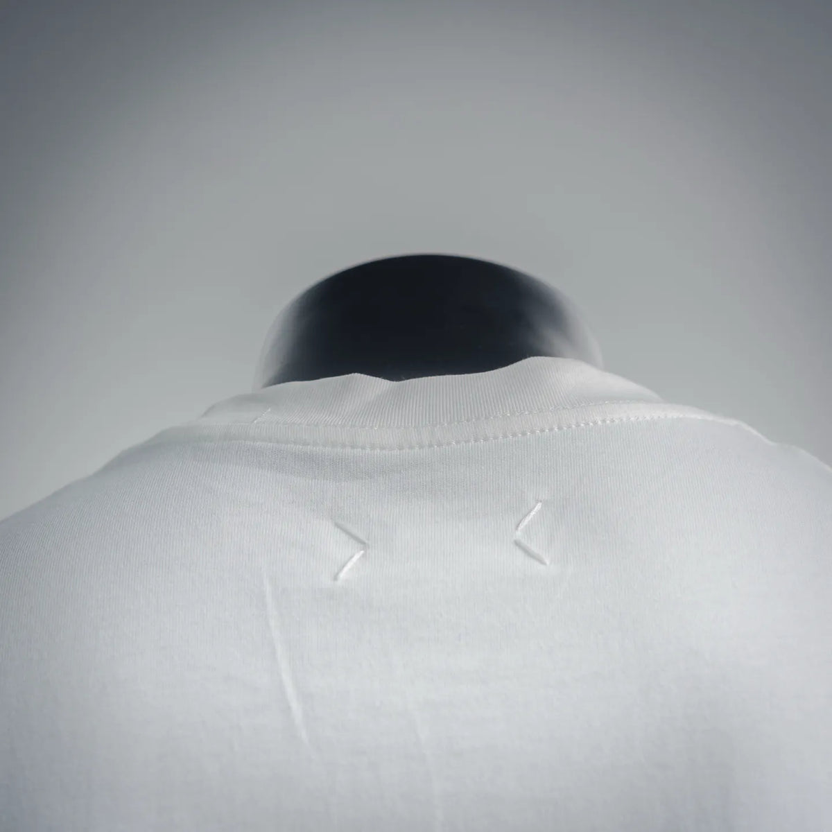 White T-shirt back with subtle collar seam details